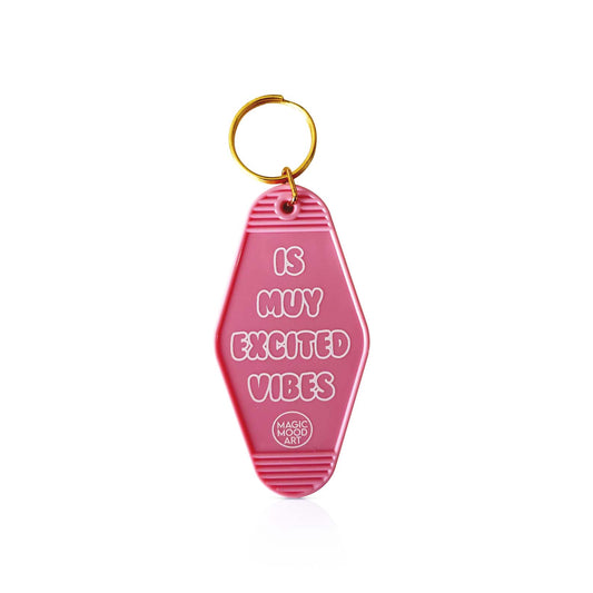 Is Muy Excited Vibes Motel Keychain in Pink